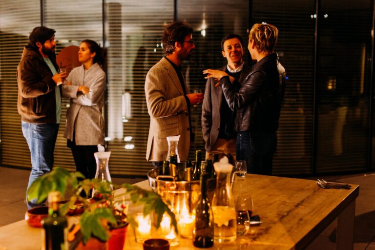 party people standing while talking each other